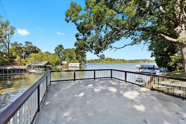 3155 Ridge Rd, White Lake, MI 48383 - view of patio with a water view