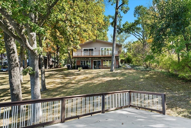 3155 Ridge Rd, White Lake, MI 48383 - rear view of property with a deck