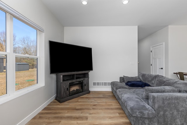 2084 W Fenwick Rd, Fenwick, MI 48834 - living area featuring visible vents, recessed lighting, baseboards, and light wood-type flooring