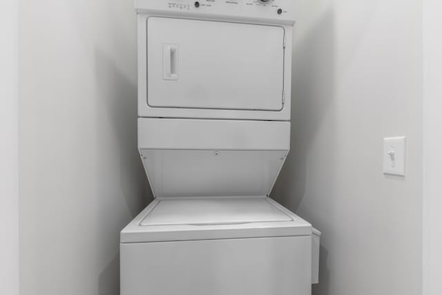 2084 W Fenwick Rd, Fenwick, MI 48834 - laundry area with laundry area and stacked washing maching and dryer