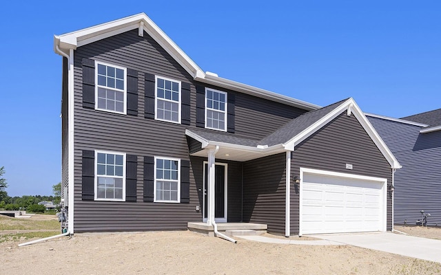 13662 Oasis Ave, Holland, MI 49424 - view of front of home with an attached garage and driveway