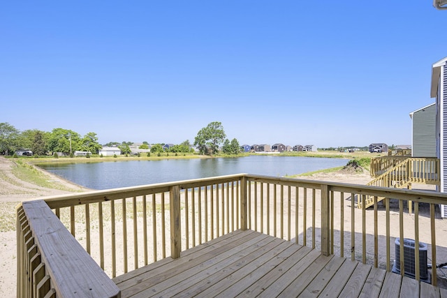 13662 Oasis Ave, Holland, MI 49424 - wooden deck with a water view