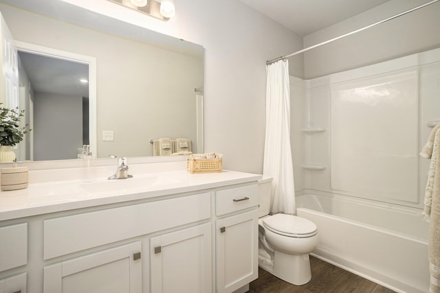 13662 Oasis Ave, Holland, MI 49424 - bathroom with vanity, shower / tub combo with curtain, and wood finished floors