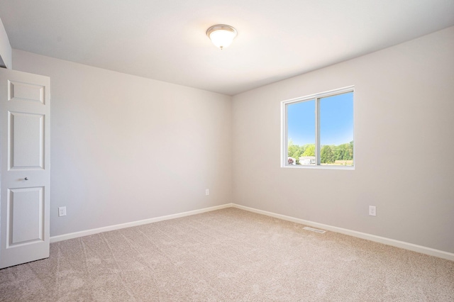 13662 Oasis Ave, Holland, MI 49424 - spare room with light carpet