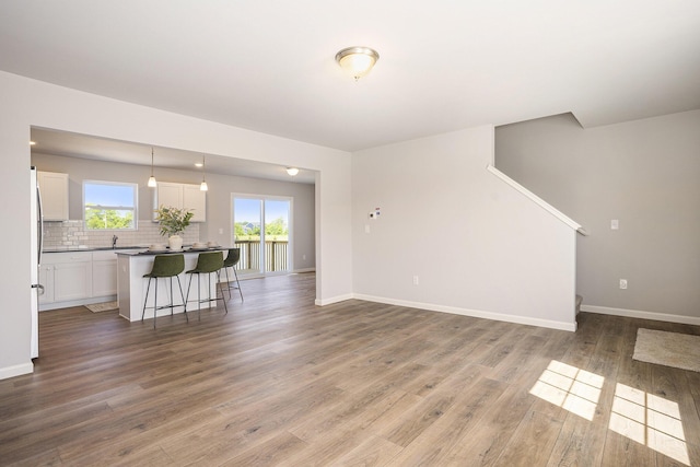 13662 Oasis Ave, Holland, MI 49424 - living room with wood finished floors and baseboards