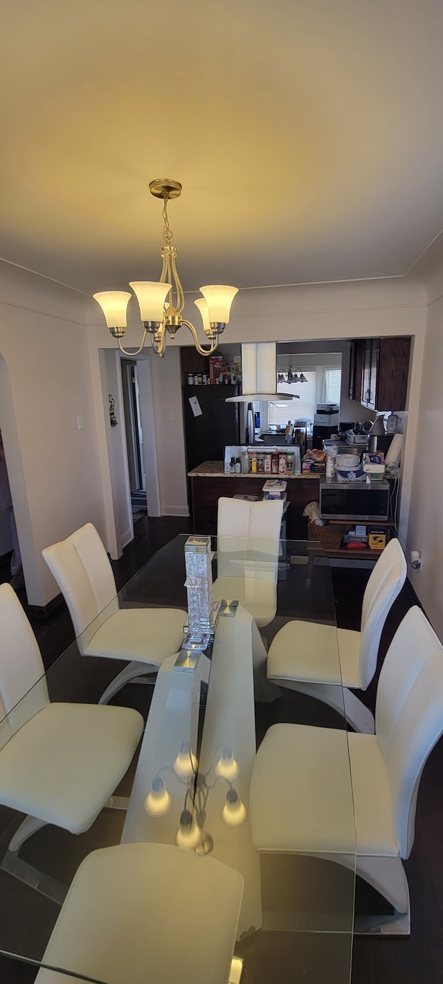 dining room featuring a chandelier