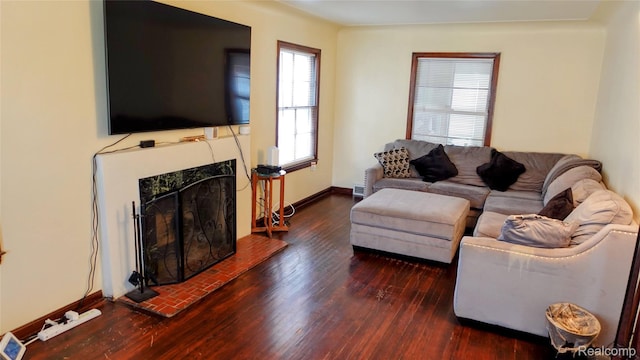 18229 Littlefield St, Detroit, MI 48235 - living room with wood-type flooring, a fireplace, and baseboards