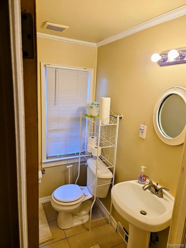 18229 Littlefield St, Detroit, MI 48235 - half bath featuring tile patterned flooring, a sink, crown molding, toilet, and baseboards