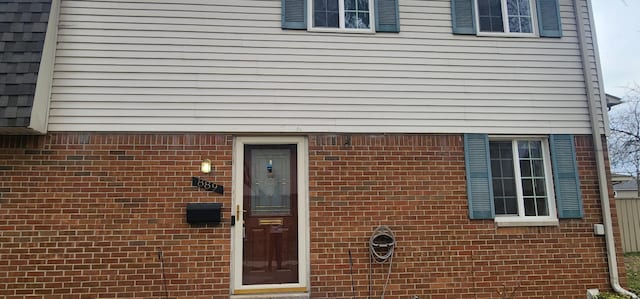 889 Kirts Blvd, Troy, MI 48084 - doorway to property featuring brick siding