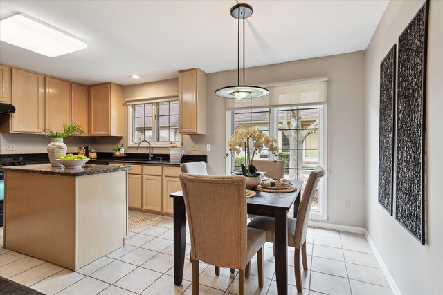dining space with light tile patterned floors, baseboards, and recessed lighting