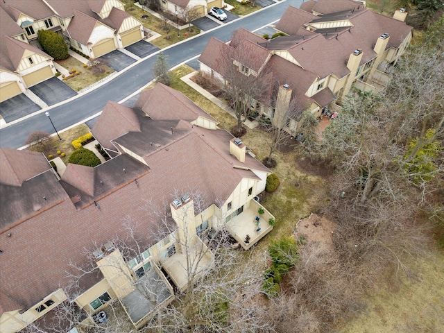 birds eye view of property with a residential view