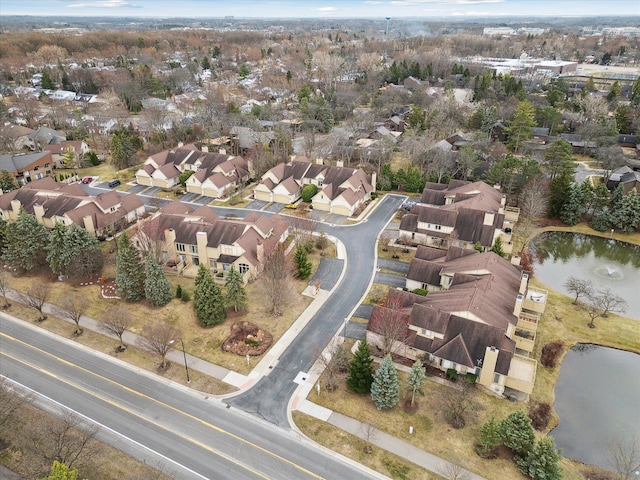 aerial view featuring a water view and a residential view