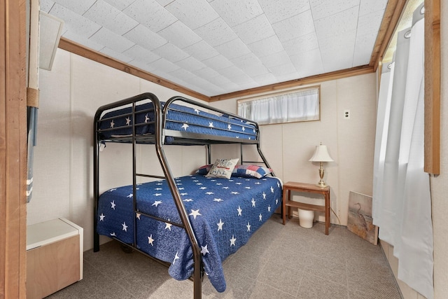 bedroom with carpet floors and ornamental molding