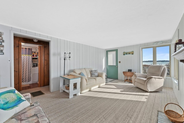living area featuring light carpet and visible vents
