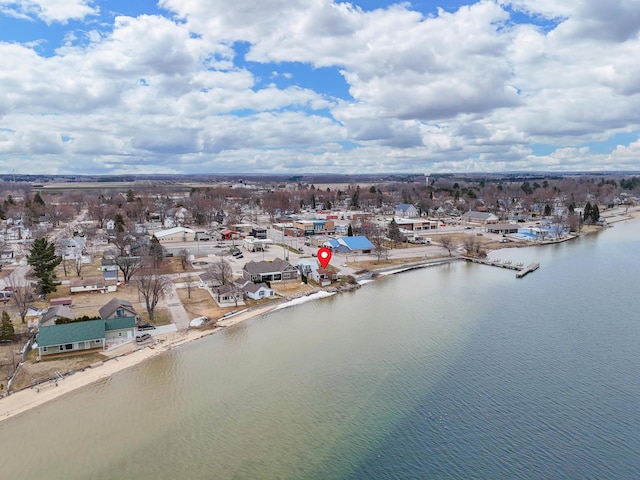 aerial view featuring a residential view and a water view