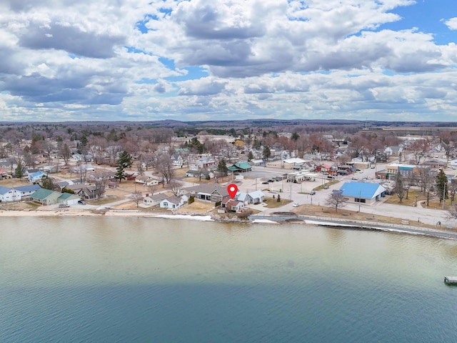 bird's eye view with a water view and a residential view