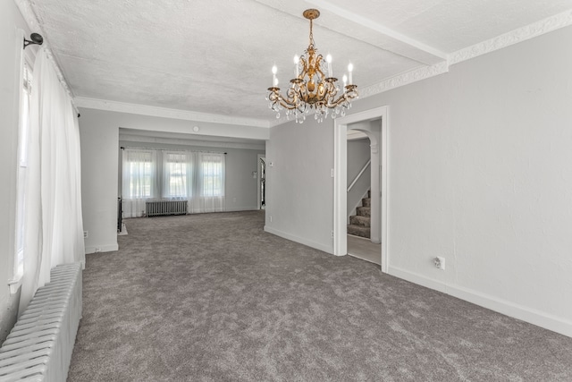 8735 Marygrove Dr, Detroit, MI 48221 - carpeted empty room with baseboards, ornamental molding, a chandelier, radiator, and arched walkways