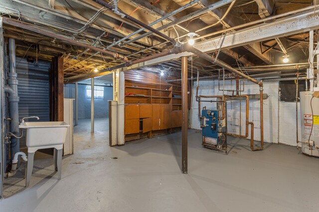 8735 Marygrove Dr, Detroit, MI 48221 - unfinished below grade area featuring water heater and a heating unit