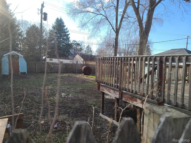 3685 Main St, Akron, MI 48701 - fenced backyard featuring a deck