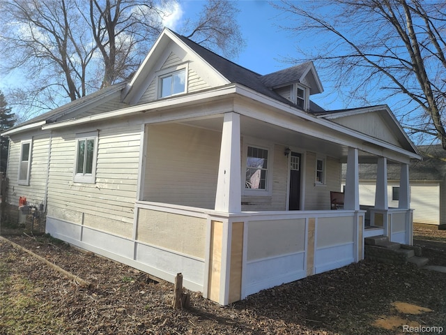 3685 Main St, Akron, MI 48701 - view of side of property featuring a porch