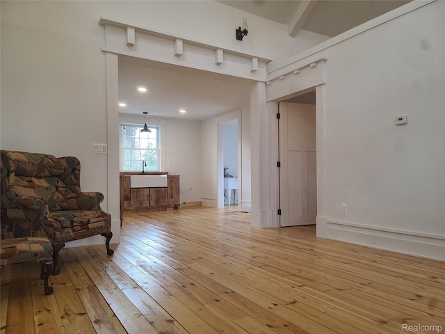 3685 Main St, Akron, MI 48701 - sitting room featuring light wood-type flooring, beamed ceiling, and recessed lighting