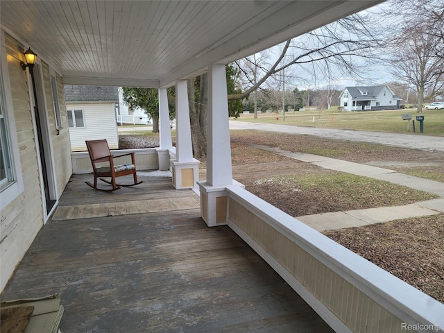3685 Main St, Akron, MI 48701 - view of wooden porch
