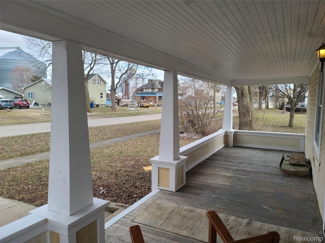 3685 Main St, Akron, MI 48701 - wooden porch featuring a residential view