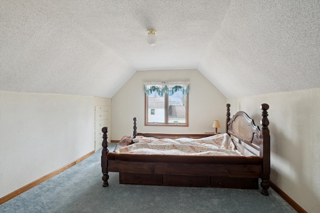carpeted bedroom with baseboards, lofted ceiling, and a textured ceiling