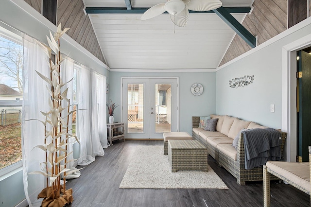sunroom / solarium featuring french doors and beam ceiling