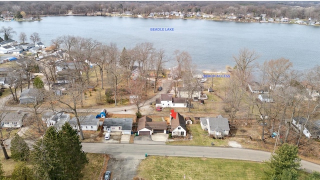 birds eye view of property with a residential view and a water view