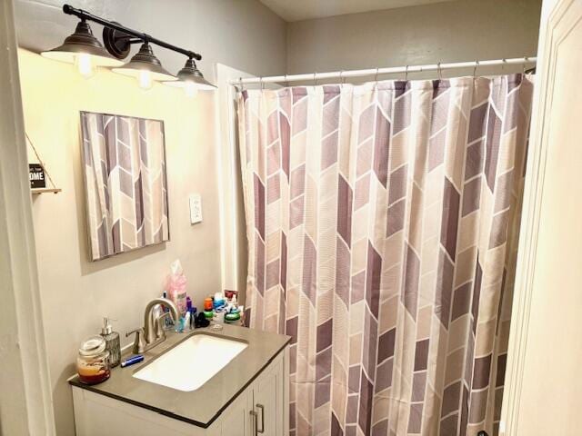 1024 Madison St, Muskegon, MI 49442 - full bathroom with curtained shower and vanity