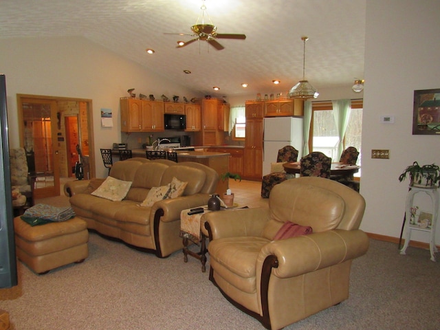 living area with baseboards, recessed lighting, a ceiling fan, light carpet, and lofted ceiling