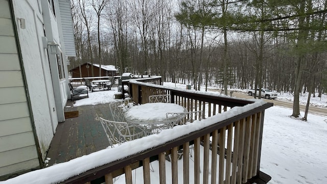 12181 Trail Creek Dr, Stanwood, MI 49346 - snow covered deck featuring outdoor dining space