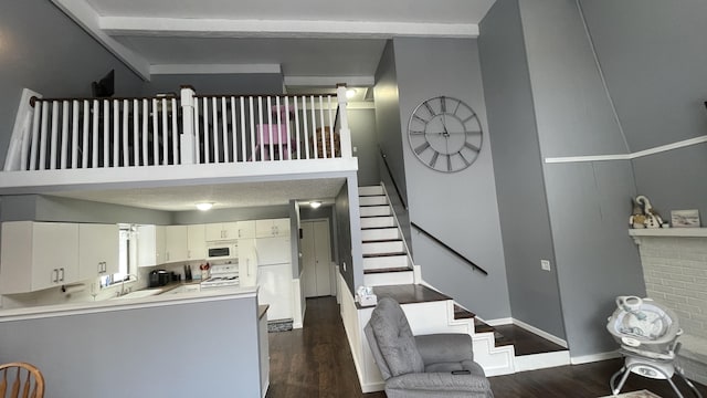 12181 Trail Creek Dr, Stanwood, MI 49346 - stairs featuring baseboards and wood finished floors