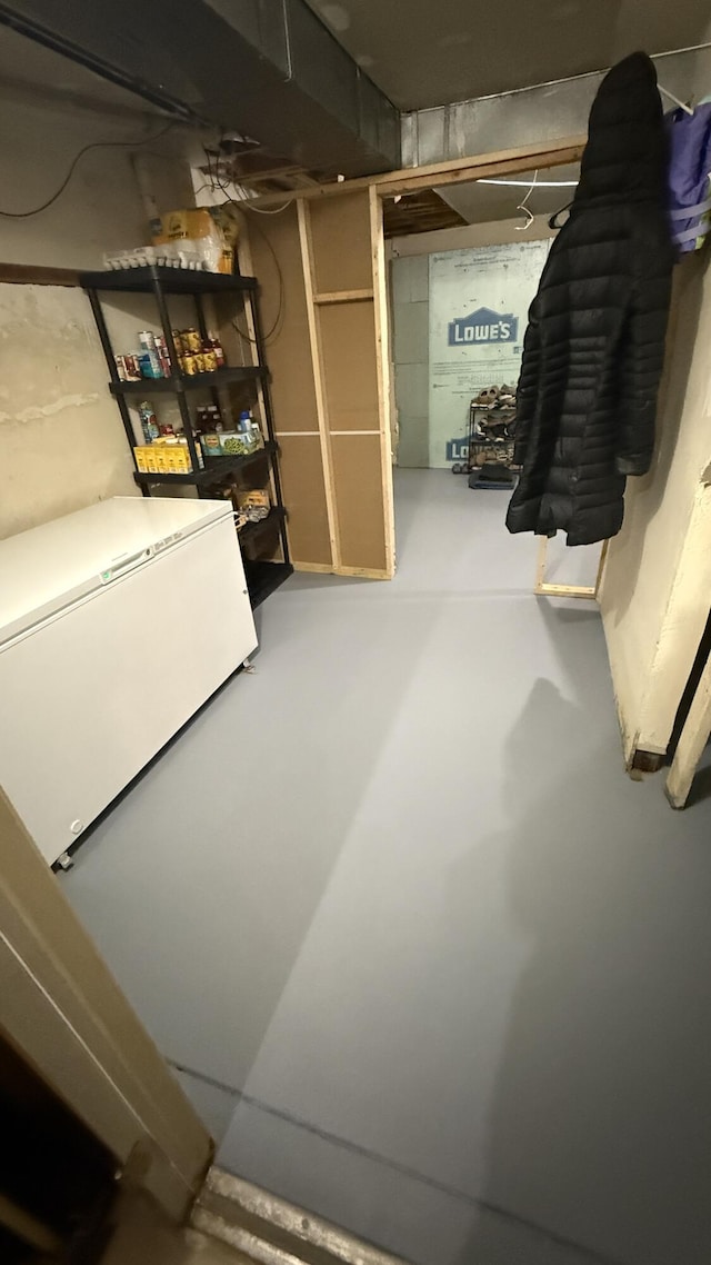 12181 Trail Creek Dr, Stanwood, MI 49346 - unfinished basement featuring fridge