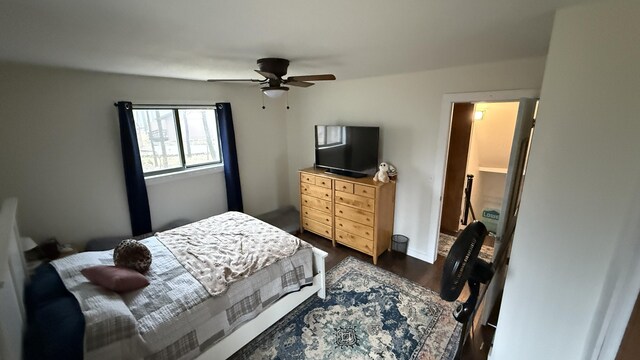 12181 Trail Creek Dr, Stanwood, MI 49346 - bedroom with a ceiling fan, baseboards, and dark wood finished floors