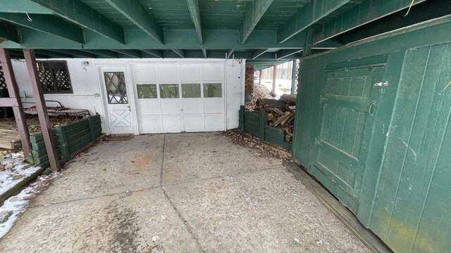 12181 Trail Creek Dr, Stanwood, MI 49346 - garage featuring driveway