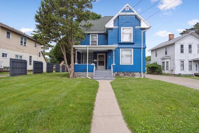 612 Lansing Ave, Jackson, MI 49202 - view of front of house featuring a front lawn