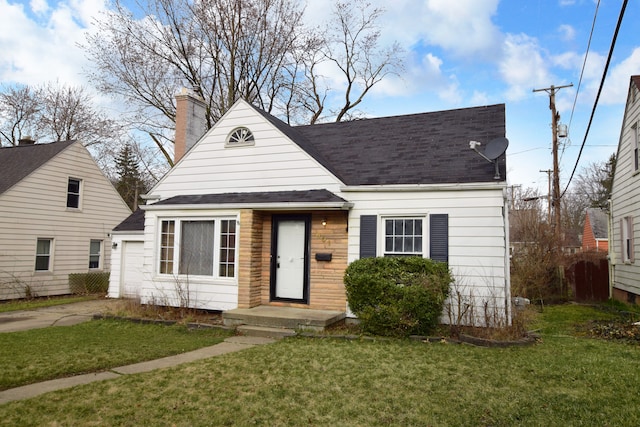 view of front of house with a chimney, a garage, roof with shingles, and a front yard
