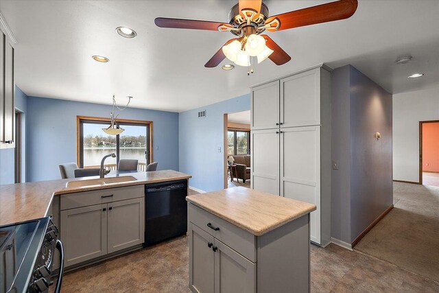 kitchen with range, a sink, recessed lighting, black dishwasher, and a ceiling fan