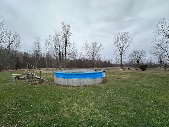 13027 Norman Rd, Brockway, MI 48097 - view of pool featuring a covered pool and a yard