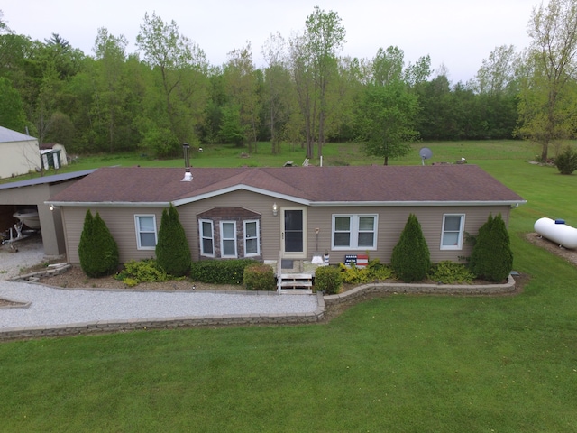 13027 Norman Rd, Brockway, MI 48097 - ranch-style house featuring a front lawn