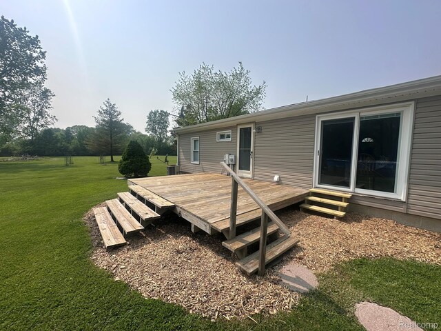 13027 Norman Rd, Brockway, MI 48097 - wooden terrace featuring a lawn and entry steps