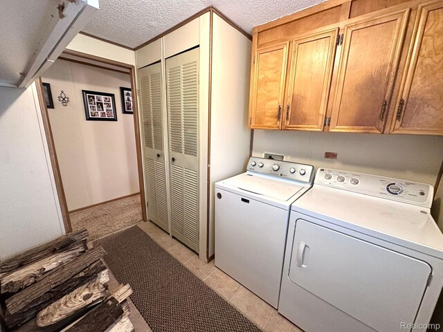13027 Norman Rd, Brockway, MI 48097 - laundry area with cabinet space, separate washer and dryer, and a textured ceiling