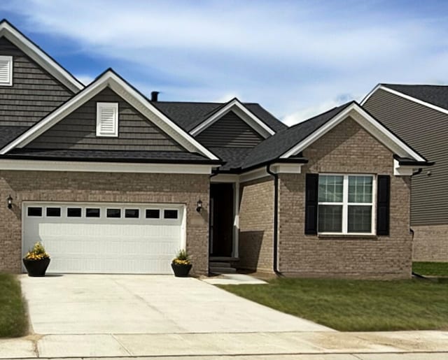 16104 Conifer Ln, Clinton Township, MI 48038 - craftsman-style home featuring driveway, brick siding, a garage, and a front yard