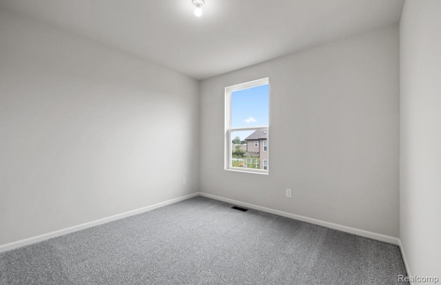 1466 Addison Cir, Walled Lake, MI 48390 - carpeted empty room featuring baseboards