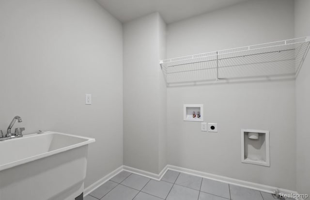 1466 Addison Cir, Walled Lake, MI 48390 - washroom featuring hookup for an electric dryer, hookup for a washing machine, and light tile patterned flooring