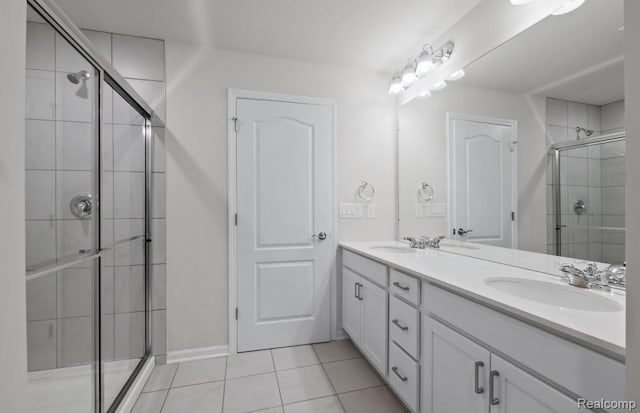 1466 Addison Cir, Walled Lake, MI 48390 - bathroom featuring double vanity, a shower stall, and tile patterned flooring