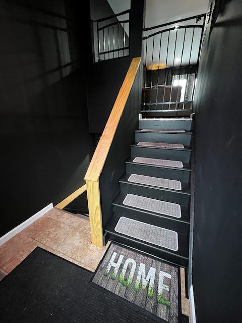 staircase with baseboards