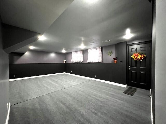 basement featuring baseboards